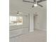 Bedroom featuring wood-look flooring, ceiling fan and mirrored closet at 3941 W Desert Hills Dr, Phoenix, AZ 85029