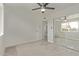 Bedroom featuring wood-look flooring, ceiling fan and mirrored closet at 3941 W Desert Hills Dr, Phoenix, AZ 85029