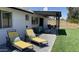 Outdoor oasis with artificial turf, a pool, a patio, and ample space for relaxation at 4038 W Windrose Dr, Phoenix, AZ 85029