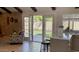 View of the spacious backyard and covered patio from the home's living and kitchen area at 4038 W Windrose Dr, Phoenix, AZ 85029
