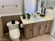 Well-lit bathroom with modern fixtures, stylish vanity, and tiled flooring at 4038 W Windrose Dr, Phoenix, AZ 85029