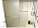 Bathroom featuring shower with glass door and updated fixtures at 4038 W Windrose Dr, Phoenix, AZ 85029
