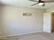 Neutral bedroom featuring ceiling fan and modern decor at 4038 W Windrose Dr, Phoenix, AZ 85029