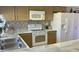 Modern kitchen featuring stainless steel appliances, granite countertops, and tile backsplash at 4038 W Windrose Dr, Phoenix, AZ 85029