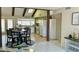 Spacious kitchen featuring an open floor plan, a large window, and modern appliances at 4038 W Windrose Dr, Phoenix, AZ 85029