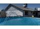 Backyard pool on a sunny day provides an oasis in the desert at 4038 W Windrose Dr, Phoenix, AZ 85029