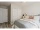 Comfortable bedroom featuring a bed, closet, and natural light at 4215 S Marisol Ln, Gilbert, AZ 85297