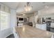 An open-concept dining area leads to a modern kitchen and inviting living space at 4215 S Marisol Ln, Gilbert, AZ 85297