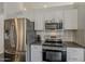 Kitchen featuring stainless steel appliances and lots of cabinet space at 4215 S Marisol Ln, Gilbert, AZ 85297