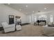 Bright living room featuring a piano, neutral decor, and ample natural light at 4215 S Marisol Ln, Gilbert, AZ 85297
