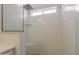 Modern shower with white subway tile, a rain shower head, and a built-in seat at 4215 S Marisol Ln, Gilbert, AZ 85297