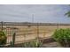 Fenced backyard showcasing mountain views and desert landscaping at 4497 E Ficus Way, Gilbert, AZ 85298