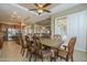 Elegant dining space offers open layout to the kitchen and living area, perfect for entertaining guests at 4497 E Ficus Way, Gilbert, AZ 85298