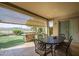 Charming outdoor patio with ample seating and a cozy fire pit for entertaining and relaxation at 4497 E Ficus Way, Gilbert, AZ 85298
