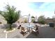 This backyard offers seating, a rock garden, and a desert ambiance at 4774 E Chromium Rd, San Tan Valley, AZ 85143