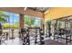 Bright and airy gym with large windows, stone accents, and various weightlifting machines at 4774 E Chromium Rd, San Tan Valley, AZ 85143