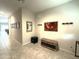 Open-concept hallway features tile flooring, storage bench, and decorative wall decor at 4774 E Chromium Rd, San Tan Valley, AZ 85143