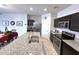 Beautiful kitchen features an island sink, stainless steel appliances, and granite countertops at 4774 E Chromium Rd, San Tan Valley, AZ 85143