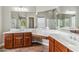 Large bathroom featuring a dual sink vanity with granite countertops, a soaking tub and a walk-in shower at 5042 W Lariat Ln, Phoenix, AZ 85083