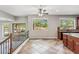 Sunny dining area with tile floors, backyard views, and access to kitchen at 5042 W Lariat Ln, Phoenix, AZ 85083