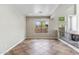 Open living area with tile flooring and clerestory windows at 5042 W Lariat Ln, Phoenix, AZ 85083