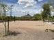 Enjoy a community sand volleyball court with mountain views and mature landscaping at 5042 W Lariat Ln, Phoenix, AZ 85083