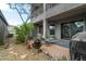 Scenic backyard with desert landscaping, covered patio, and comfortable outdoor seating at 5118 S Morning Sky Trl, Gold Canyon, AZ 85118