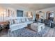 Comfortable living room showcasing an eclectic mix of furniture, decor, and a decorative area rug at 541 W Palm Ln, Phoenix, AZ 85003