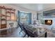 Bright living room featuring a fireplace, bay window, and dark wood floors, enhancing the charm at 541 W Palm Ln, Phoenix, AZ 85003