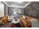 Stylish living room showcases vintage-inspired wallpaper, rich colors, and modern artwork at 541 W Palm Ln, Phoenix, AZ 85003