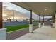 Extended covered patio with concrete and gravel, offering scenic mountain views at 6244 S Flora Ln, Gold Canyon, AZ 85118