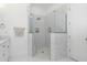 Step into luxury with this glass shower featuring marble tiling and modern fixtures at 6244 S Flora Ln, Gold Canyon, AZ 85118