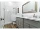 Modern bathroom with double vanity, quartz countertops, and walk-in shower at 6244 S Flora Ln, Gold Canyon, AZ 85118