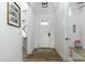 Inviting foyer with hardwood floors, coat closet, and views to other rooms at 6244 S Flora Ln, Gold Canyon, AZ 85118