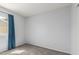 This bedroom features neutral carpet, light colored walls, and a bright window at 6413 W Monte Cristo Ave, Glendale, AZ 85306