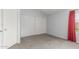 Bedroom features a large closet and window, offering ample space and natural light at 6413 W Monte Cristo Ave, Glendale, AZ 85306