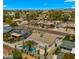 Neighborhood shot showing the home has a backyard pool, covered patio, and desert landscaping at 6833 E Grandview Dr, Scottsdale, AZ 85254