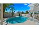 Serene backyard oasis featuring a private pool, spa, desert landscaping, and shaded pergola at 6833 E Grandview Dr, Scottsdale, AZ 85254