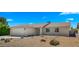 Single-story home showcasing desert landscaping, gravel, rocks, and cacti in the front yard at 6833 E Grandview Dr, Scottsdale, AZ 85254
