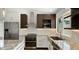 Well-appointed kitchen with stainless steel appliances, granite countertops, and ample storage space for culinary enthusiasts at 6833 E Grandview Dr, Scottsdale, AZ 85254