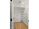 Pantry with multiple metal storage shelves at 6833 E Grandview Dr, Scottsdale, AZ 85254