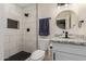 Renovated bathroom featuring modern fixtures, granite counters and a walk-in shower at 6908 W Wanda Lynn Ln, Peoria, AZ 85382