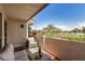 Serene balcony with comfortable seating and a picturesque view of the lush golf course at 7800 E Lincoln Dr # 1035, Scottsdale, AZ 85250