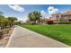 Scenic view of the community with lush greenery, sidewalks and well-maintained landscaping at 7800 E Lincoln Dr # 1035, Scottsdale, AZ 85250