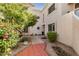 Inviting condo exterior with desert landscaping and a charming walkway at 7800 E Lincoln Dr # 1035, Scottsdale, AZ 85250