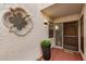 Close up of condo entrance showing unique design details and desert landscaping at 7800 E Lincoln Dr # 1035, Scottsdale, AZ 85250