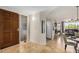 Inviting foyer with stone floors leading into an open concept living space at 7800 E Lincoln Dr # 1035, Scottsdale, AZ 85250