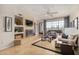 Comfortable living room with tile fireplace, modern decor and bright natural light at 7800 E Lincoln Dr # 1035, Scottsdale, AZ 85250
