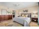 Comfortable main bedroom with ceiling fan, area rug, and furniture at 7800 E Lincoln Dr # 1035, Scottsdale, AZ 85250