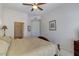 Spacious bedroom with neutral walls and carpet, and an ensuite bathroom at 8245 E Bell Rd # 128, Scottsdale, AZ 85260